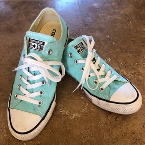 Mint green Converse sneakers. 9